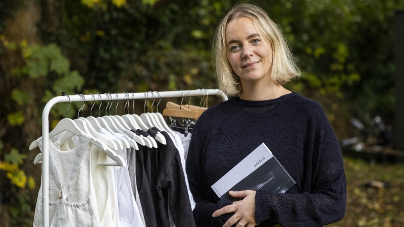 Ciara Tinney stands beside her Wildkind Irish linen Collection