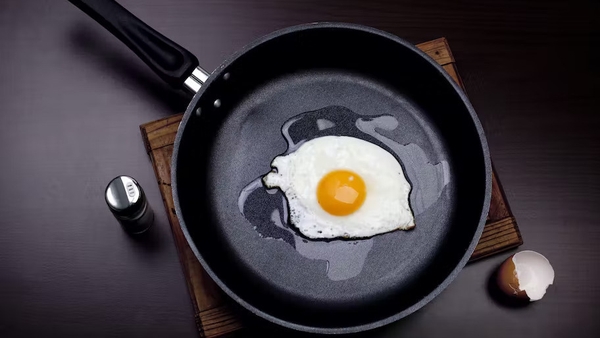 Some non-stick pans may contain forever chemicals which research shows are linked to health problems, including cancer. Photo: Parpalea Catalin/Shutterstock