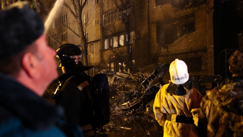 The wreckage of a Sukhoi Su-34 military jet at the crash site in a residential area in the town of Yeysk