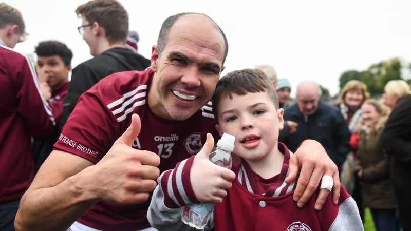 Paul Finlay and son Aaron celebrate Ballybay's win over Scotstown in the county final