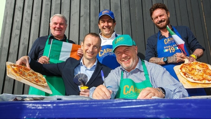 Billy Carr, Buying Director at Aldi Ireland, Stephen Carr, co-owner at Sorrento Pizza, Giorgio Lisi, co-owner and Master Baker at Sorrento Pizza, with former Irish footballer Ray Houghton and former Italian footballer Toto Schillaci