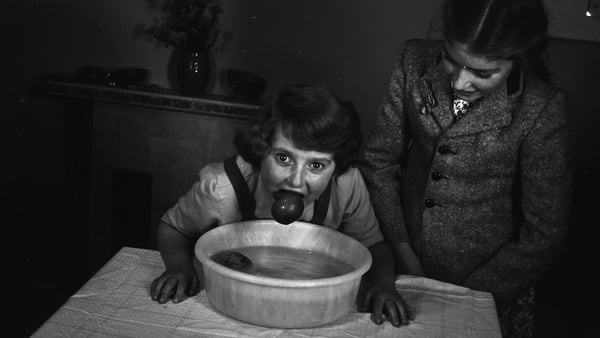Dunking for apples at Halloween. Photo: The Schools' Collection by Dúchas © National Folklore Collection UCD licensed under CC BY-NC 4.0