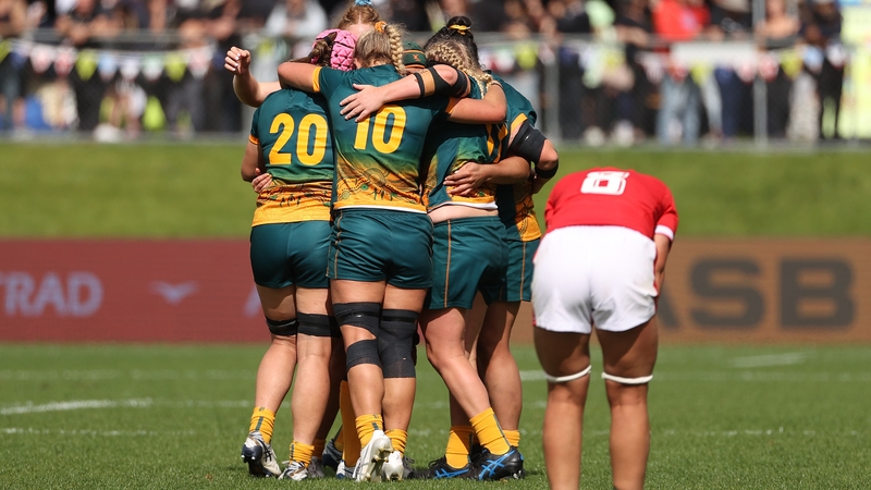 Australia players celebrate their World Cup pool victory over Wales