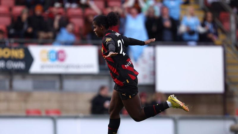 Khadija Shaw celebrates after putting Man City two up against Spurs