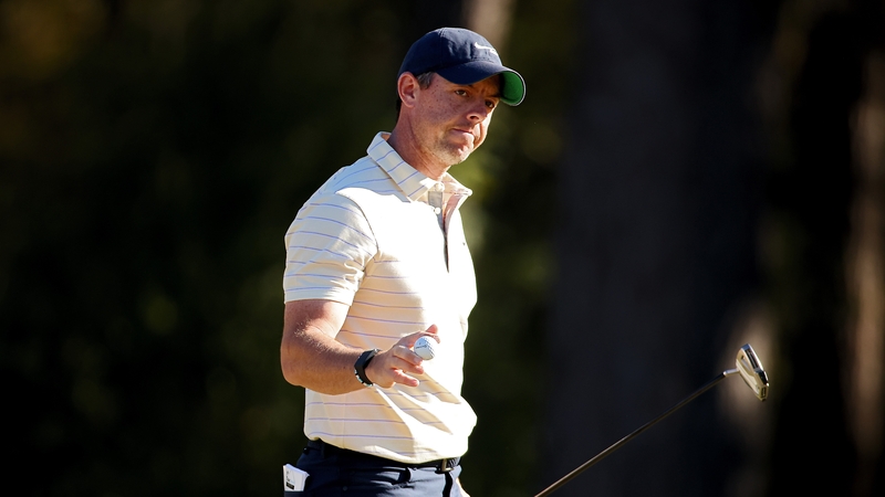 Rory McIlroy reacts to his successful eagle putt on the 12th