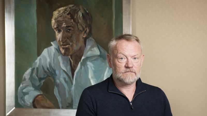 Jared Harris in front of a portrait of his father, Richard Harris (copyright The Richard Harris Estate)