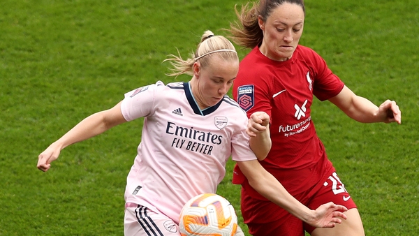 Beth Mead of Arsenal battles for possession with Megan Campbell of Liverpool