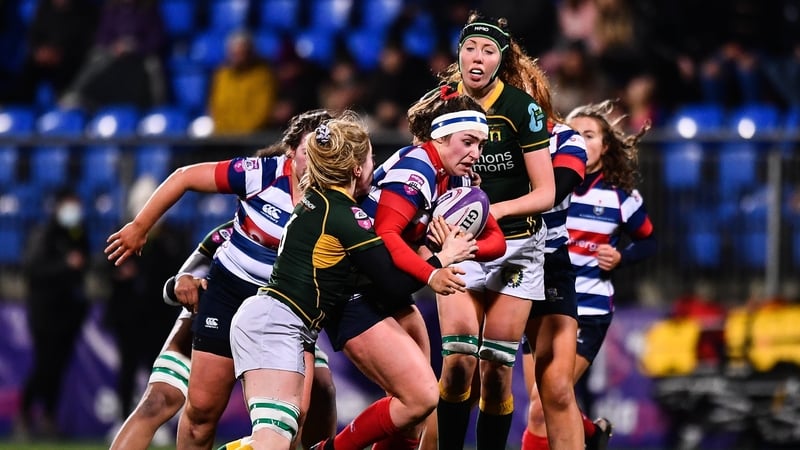 Aoife Moore of Blackrock College is tackled by Railway Union's Emma Murphy during an AIL clash last season