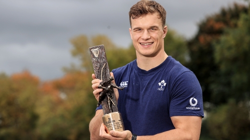 Josh van der Flier with his award