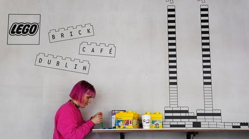 Gemma Sherlock plays with Lego as she stops for a coffee at the cafe