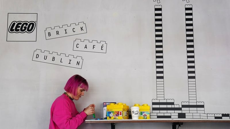 Gemma Sherlock plays with Lego as she stops for a coffee at the cafe