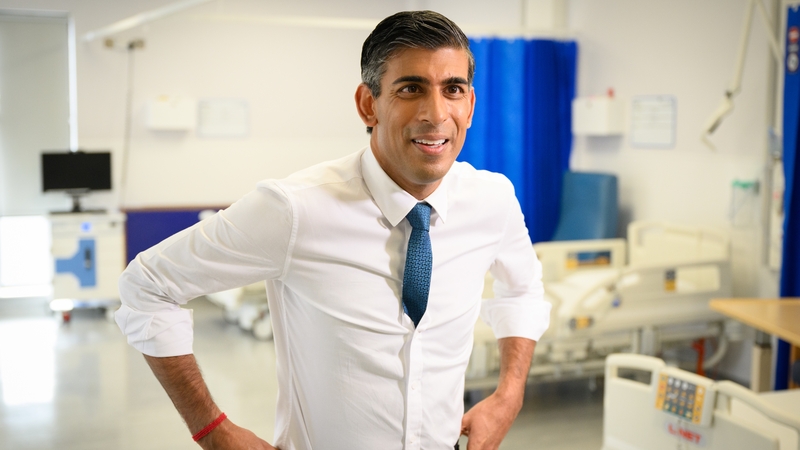 British Prime Minister Rishi Sunak speaks to the media during a visit to Croydon University Hospital, south London