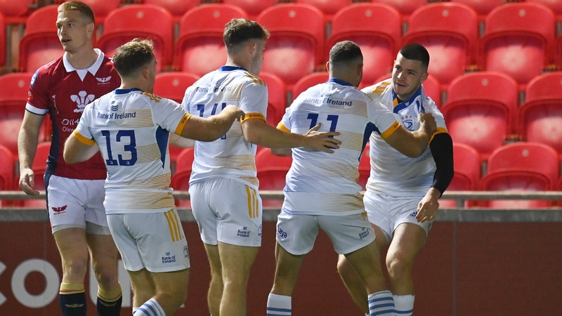 Chris Cosgrave congratulated by Leinster team-mates after scoring the opening try