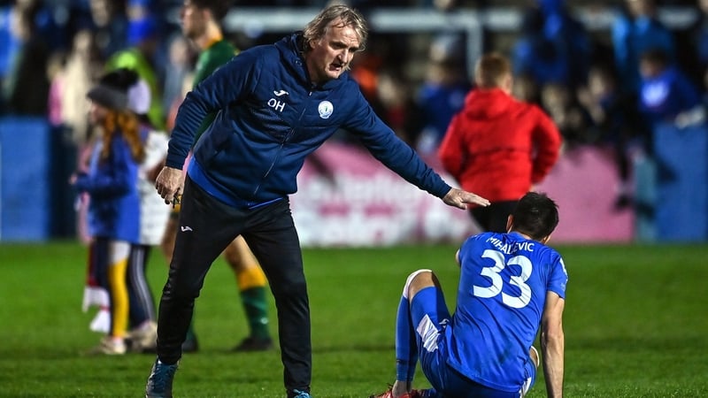 Finn Harps manager Ollie Horgan consoles Filip Mihaljevic after the relegation-confirming defeat to UCD