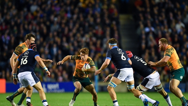 Andrew Kellaway of Australia is challenged by George Turner, Jamie Ritchie and Grant Gilchrist