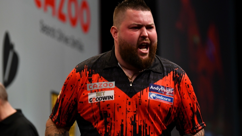Michael Smith beat Josh Rock 10-8