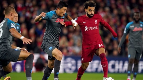 Mohamed Salah (right) and Napoli's Min-Jae Kim battle for the ball