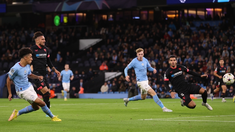 Rico Lewis of Manchester City scores