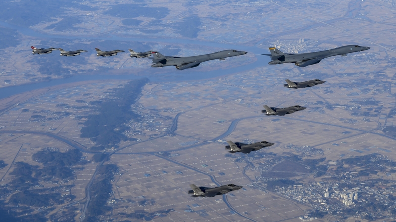 Two US B-1B Lancer strategic bombers, four South Korean Air Force F-35 fighter jets and four US Air Force F-16 fighter jets fly over South Korea during the 'Vigilant Storm' joint air drill