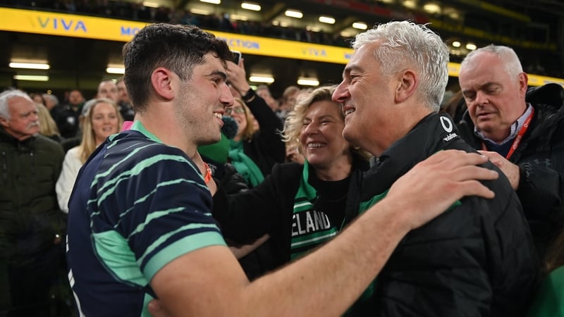 Jimmy O'Brien celebrates at full time with his parents Caroline and John
