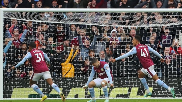 Jacob Ramsey, right, celebrates scoring Villa's third goal of the game