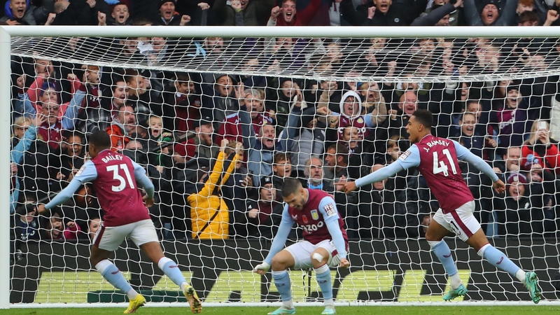 Jacob Ramsey, right, celebrates scoring Villa's third goal of the game