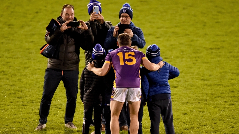 Shane Walsh has his photo taken with young supporters after the victory over Naas