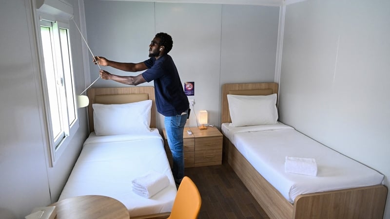 There are 6,000 air-conditioned, six-metre-long container cabins in the fan village near Doha