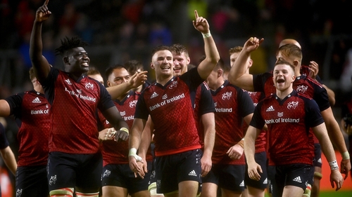 Munster's players celebrate the 28-14 win