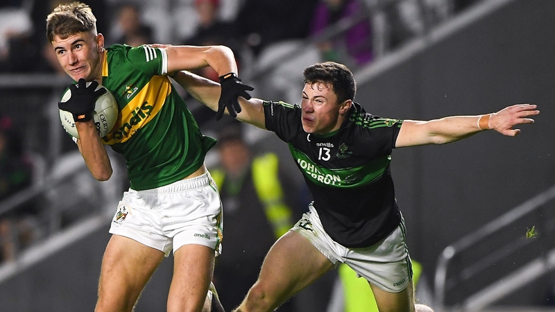 James Morris of Clonmel bursts clear of Nemo's Mark Cronin