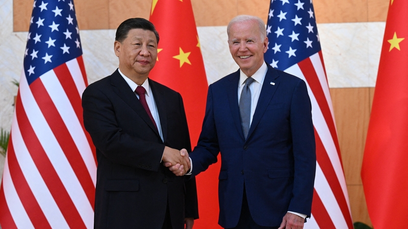 Xi Jinping and Joe Biden shake hands at the G20 summit in Bali