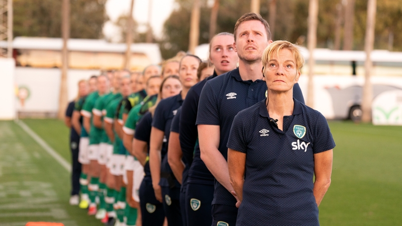 Vera Pauw lines up for the national anthems in Marbella