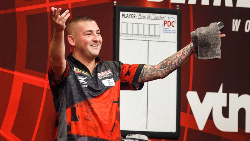 Nathan Aspinall progressed to the knockout stages