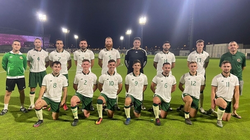 The Qatar Irish football team with co-managers Niall Keogh and Ronan Kelly