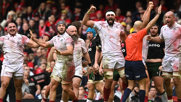 Georgia's players celebrate at the final whistle
