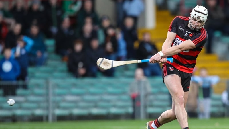 Dessie Hutchinson shoots to score Ballygunner's first goal
