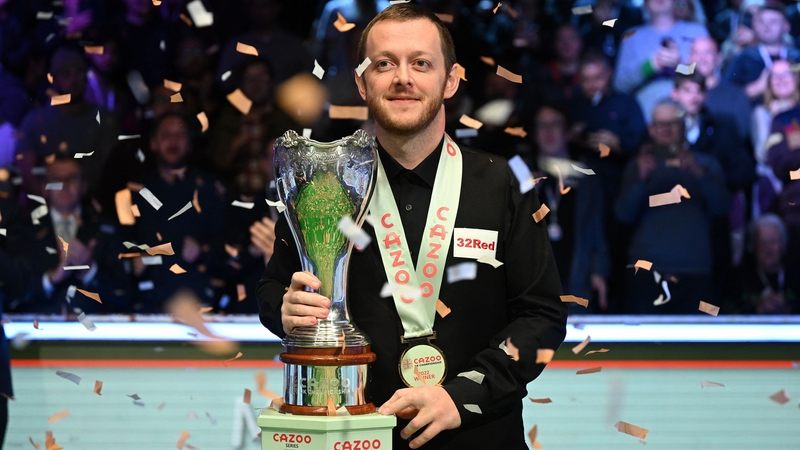 Mark Allen poses with the winner's trophy