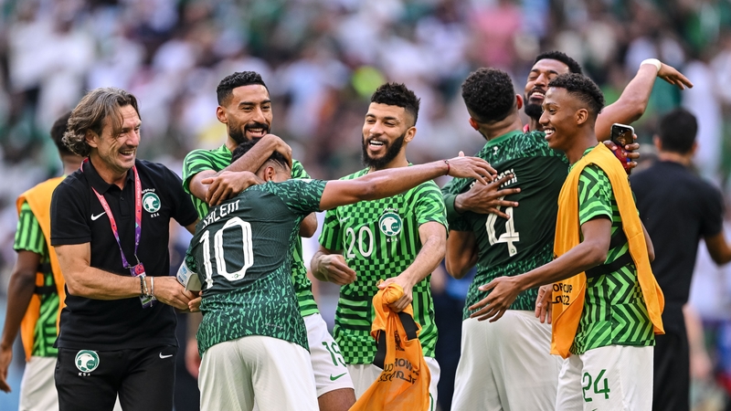 Saudi Arabia players celebrate a famous victory