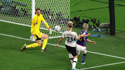 Takuma Asano scores the winner for Japan