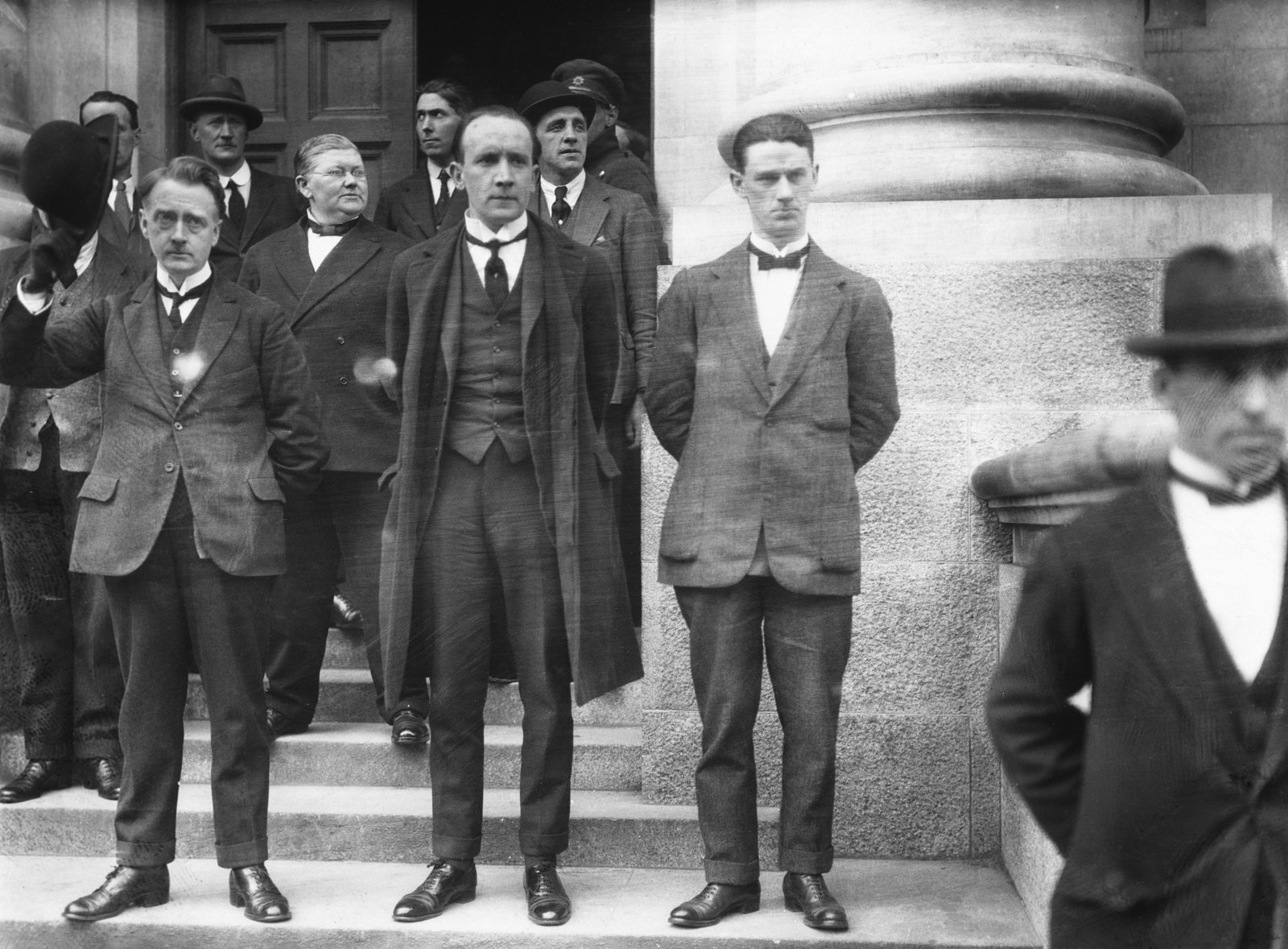 William T Cosgrave with Kevin O'Higgins, Minister for Justice, taking the salute from National Army soldiers outside Government Buildings. Photo © RTÉ Photographic Archive