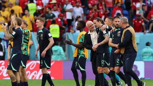 Graham Arnold with Jackson Irvine after the final whistle