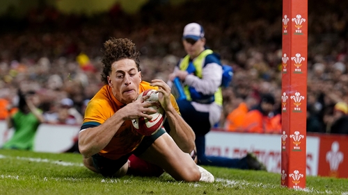 Australia's Mark Nawaqanitawase
goes over for 5 points