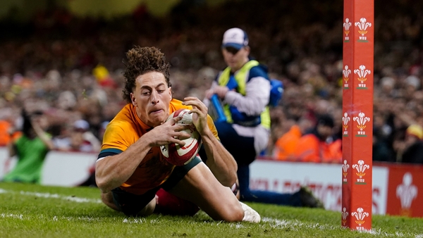 Australia's Mark Nawaqanitawase
goes over for 5 points