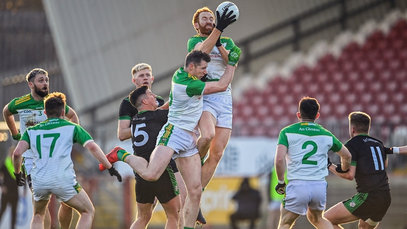 Glen's Conor Glass clasps possession in midfield