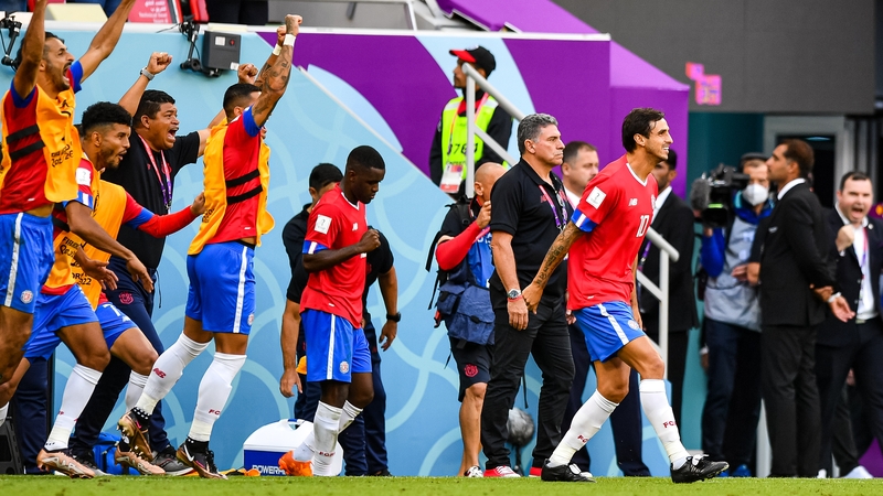 The Costa Rica bench reacts to the final whistle at the Al Bayt Stadium