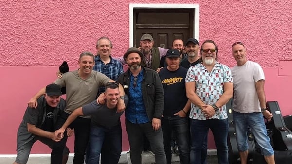 The 11 members of the White Horse Guitar Club in Ballydehob
