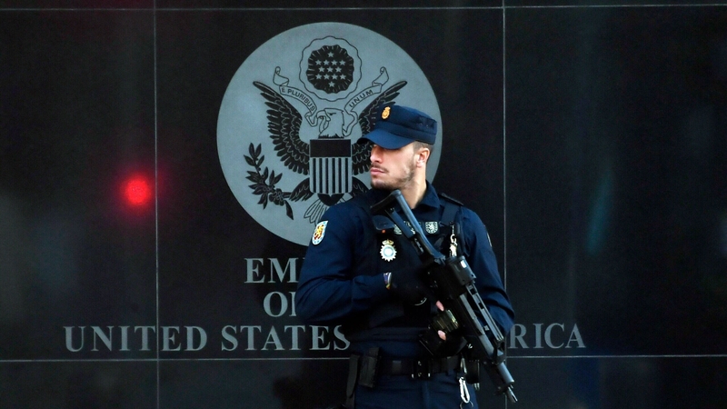 A Spanish police officer outside the US embassy in Madrid