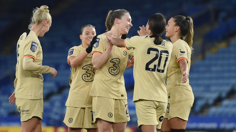 Chelsea's Niamh Charles is mobbed after her goal