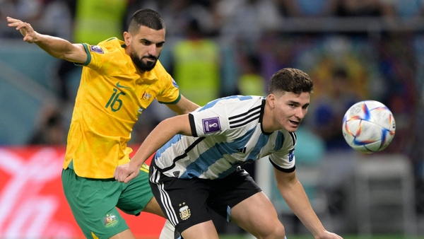 Australia's Aziz Behich battles with Julian Alvarez for possession