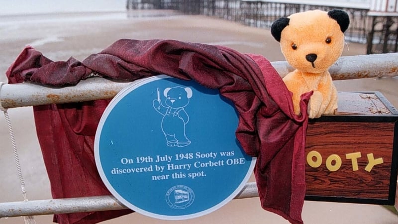 Sooty is seen here in 1997 after he was honoured with a special plaque marking the spot on the North Pier, Blackpool where he was discovered by Harry Corbett Photos: Press Association